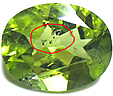 Péridot à Inclusions Péridot à Inclusions