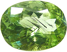 P&eacute;ridot &agrave; linclusions de ludwigite du Pakistan